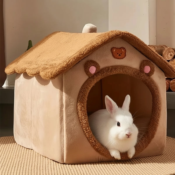 Cat peeking out from a cozy beige pet house with a brown roof.